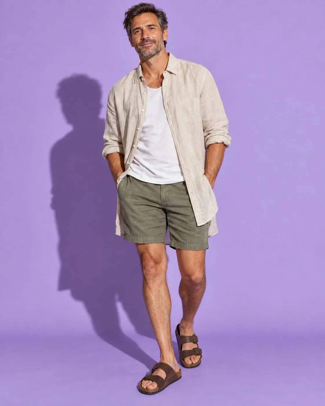 Shorts with a long open linen shirt and sandals